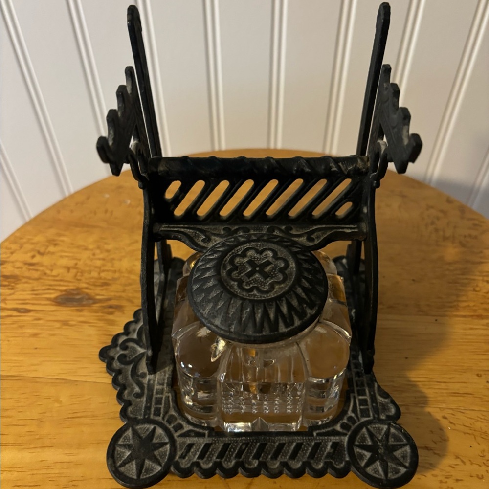 Antique Victorian style cast iron and glass inkwell
